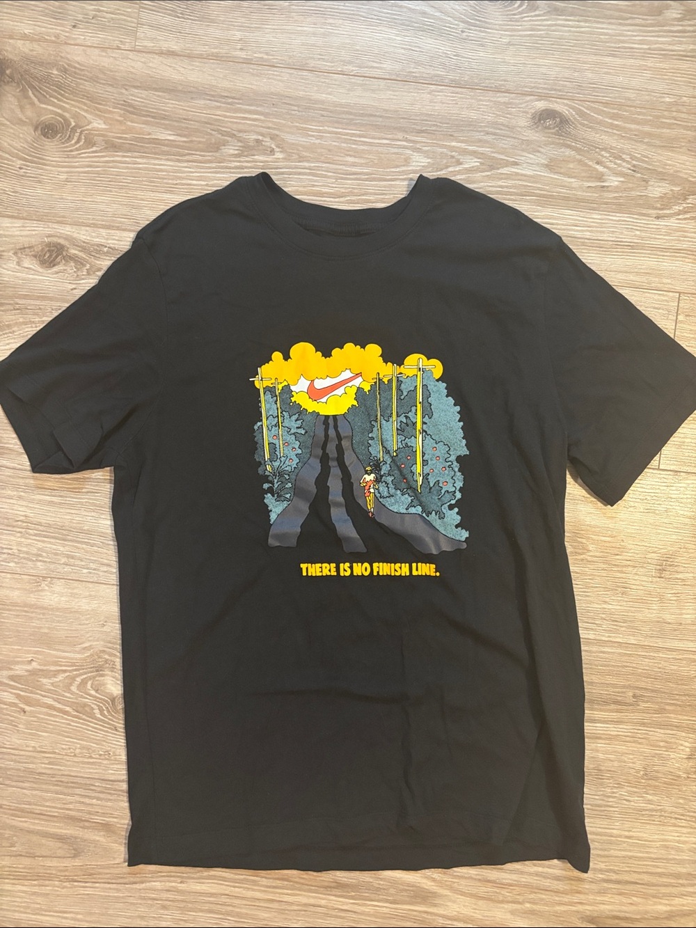 Nike Black Short-Sleeve Graphic Tee with Yellow & Blue Print